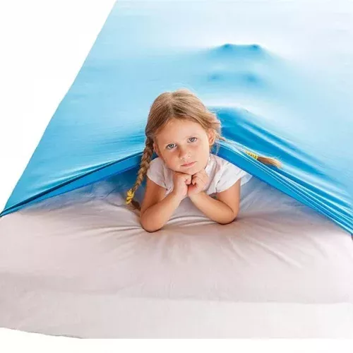 Turquoise sensory sheet shown with smiling girl